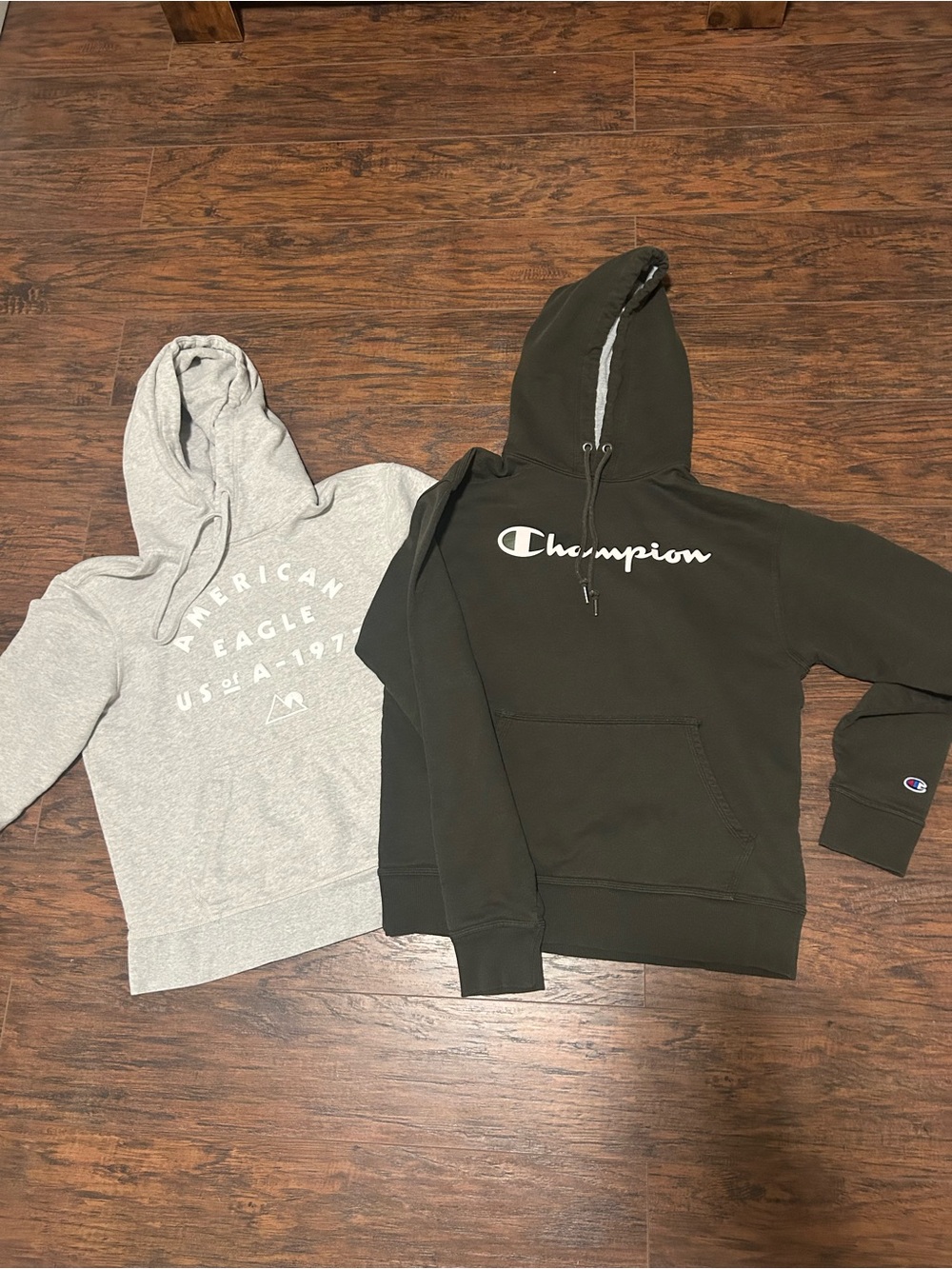 Bundle of 2 men’s MEDIUM hoodies Champion and American Eagle Black & off white